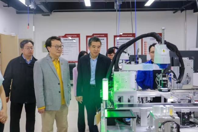 “华人管理教育第一人”余世维教授莅临太阳成集团tyc33455cc参观交流